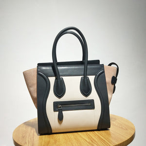 Extrem™ Cowhide smiley face shoulder bag