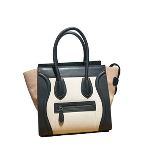 Extrem™ Cowhide smiley face shoulder bag